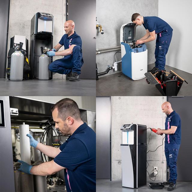 Servicetechniker arbeiten an Wasserspender und Enthärtungsanlage.