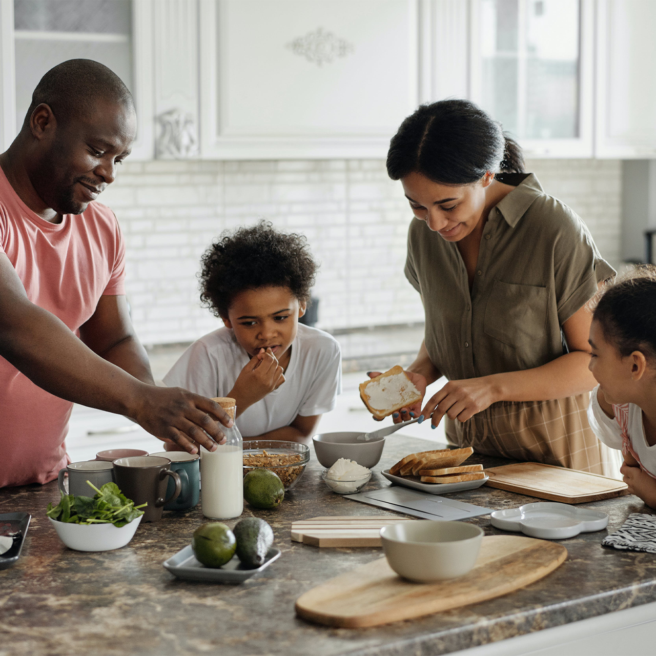 Family In Kitchen