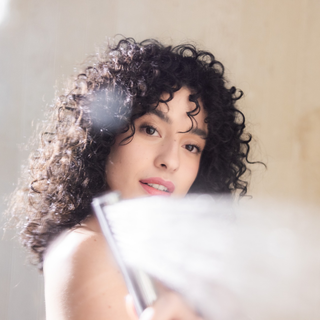 Woman with shower head