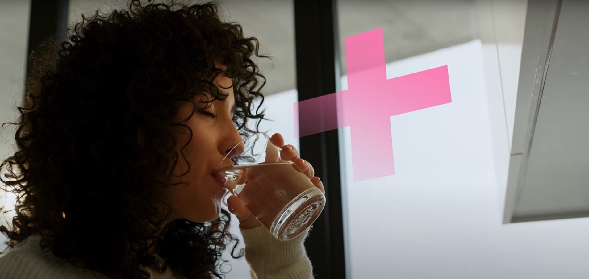 Woman drinking a glass of water