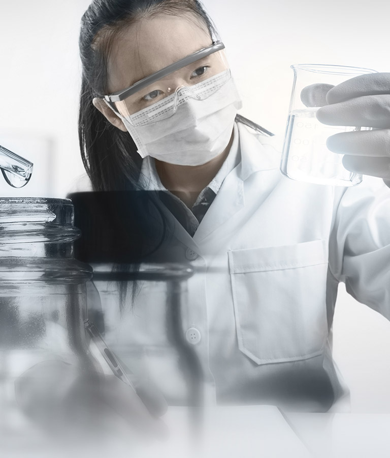 Female chemist analysing purified water