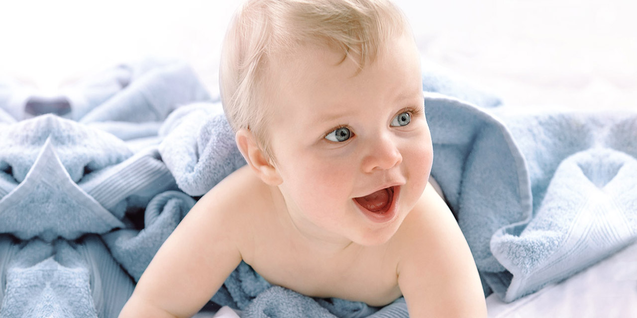 Baby on cozy blanket