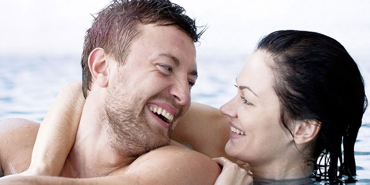Couple in swimming pool